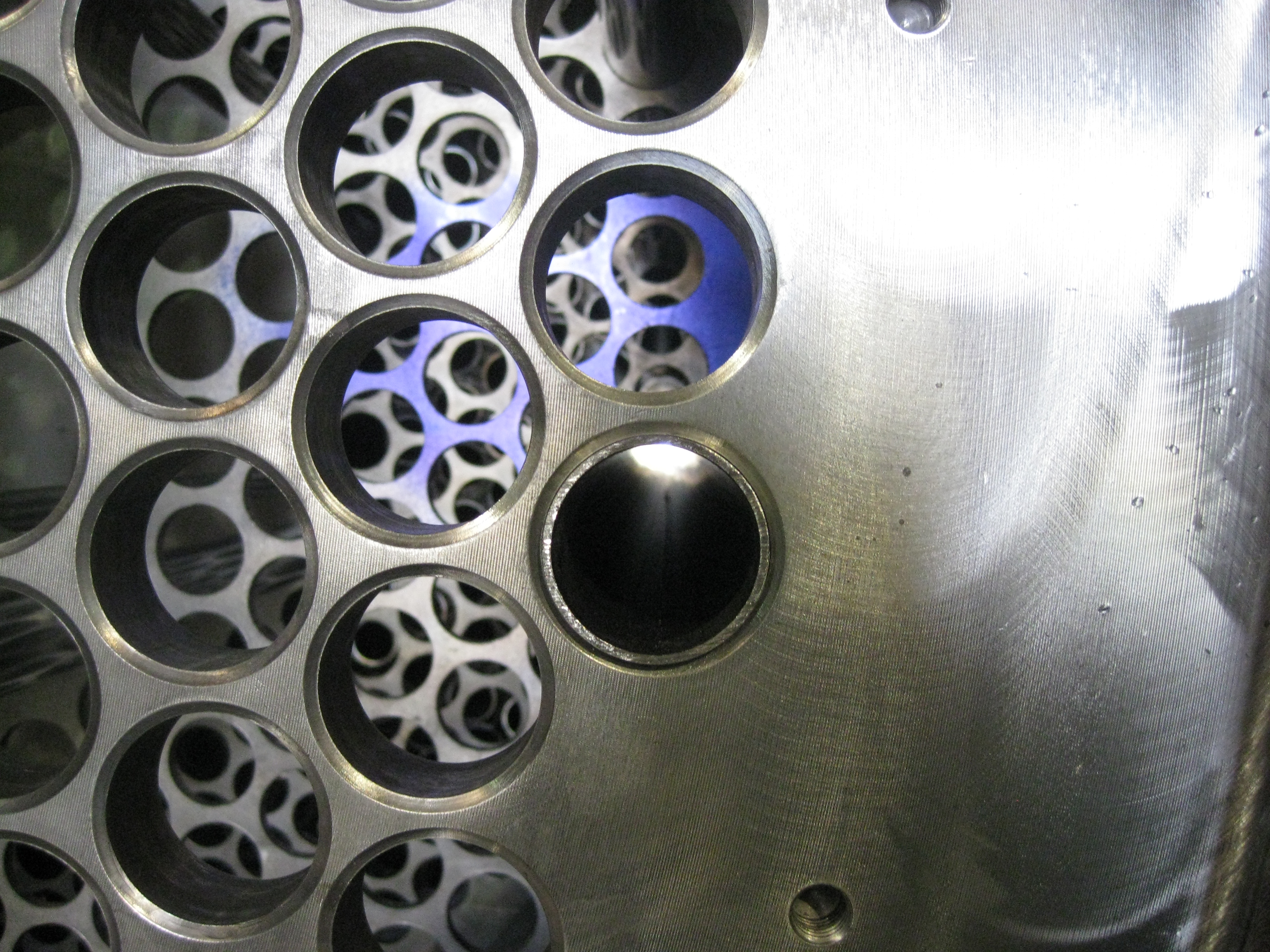 Drilled tube sheet holes on a heat exchanger during fabrication